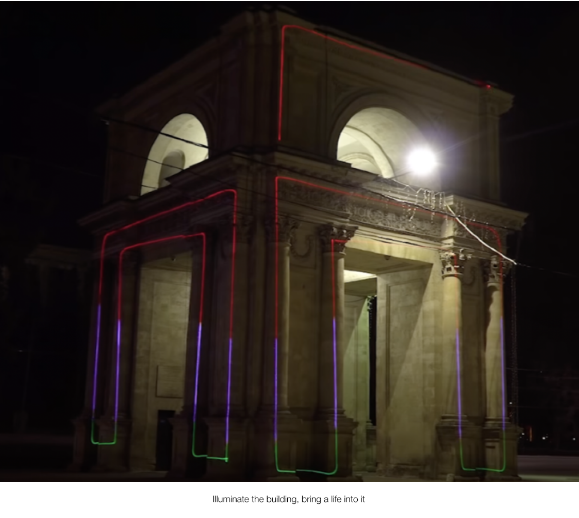 An old traditional roman structure with laser lights projected onto from a lasercube, showcasing how it can be used for outdoor advertising