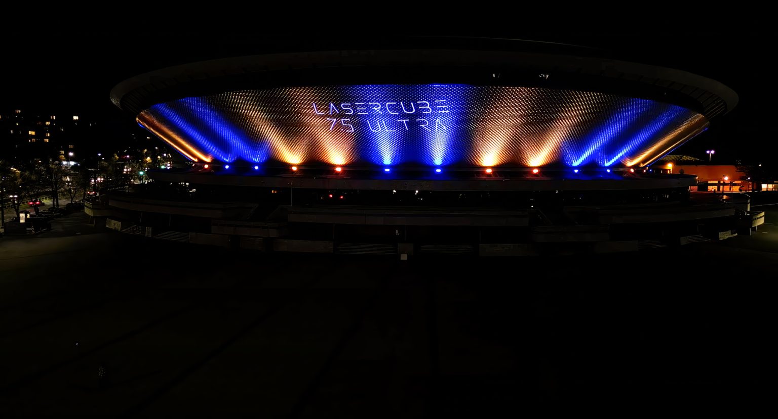 Laser lights projected for advertising on a stadium by the lasercube laser light projector